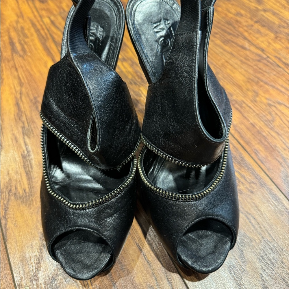 Alexander McQueen Black Heels with Peep-Toe Design and Unique Straps